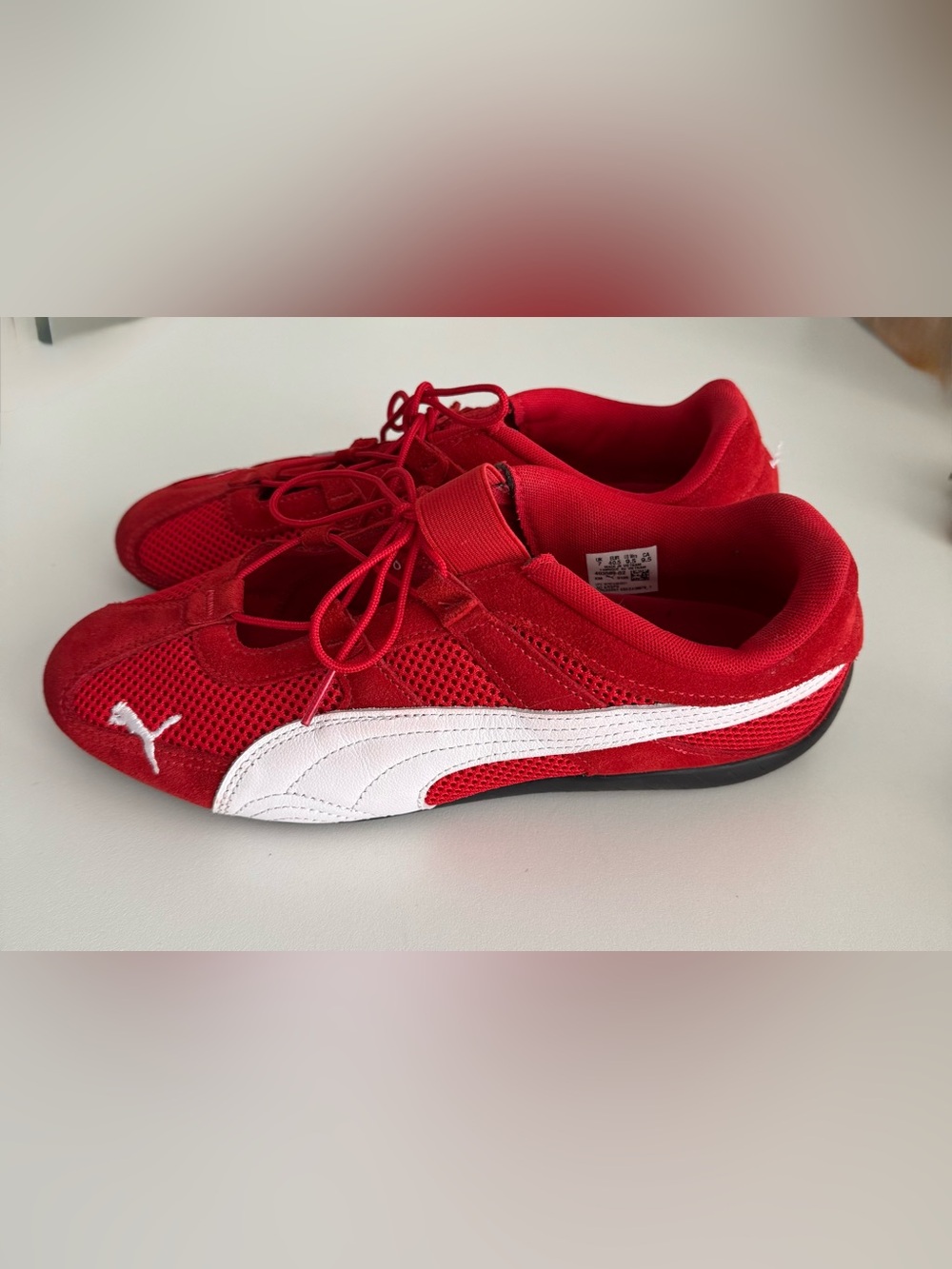 Puma Red Athletic Shoes with White Label Detail